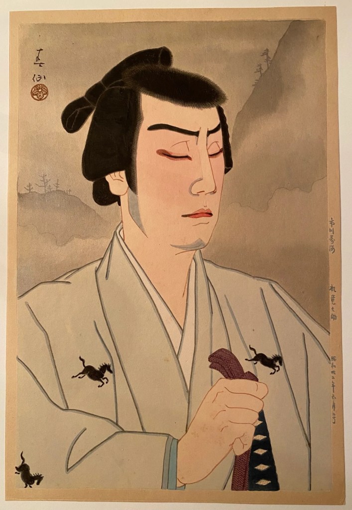 Portrait of a man in traditional Japanese clothing, featuring a serene expression, closed eyes, and distinctive hairstyles. He holds a decorative sash in one hand. Small horse motifs are visible on his clothing.
